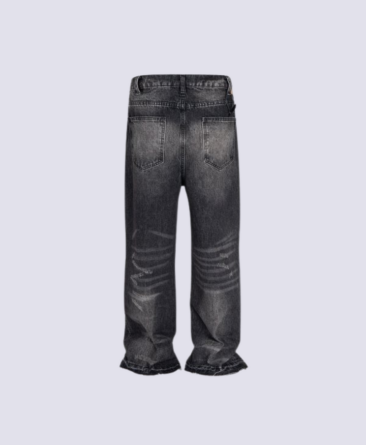SCRATCHED BLACK FLARED JEANS